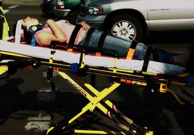 Woman injured in an ambulance