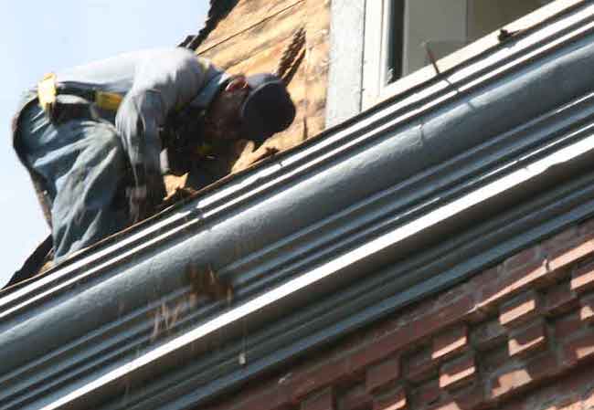 Workers with heavy items.