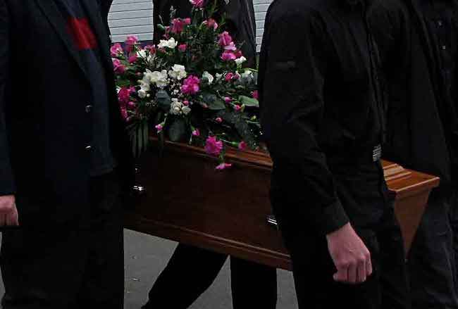 Men carrying coffin
