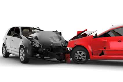 Head-on auto accident silver and red vehicles.