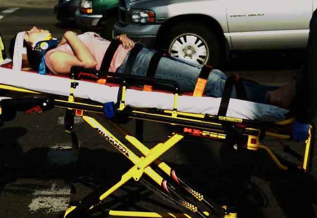 Paramedics taking a patient who has been injured, Irving Personal Injury Lawyer