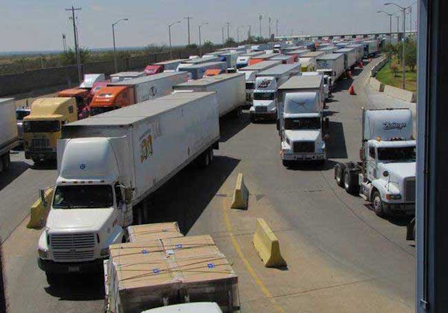 Long line of trucks entering country